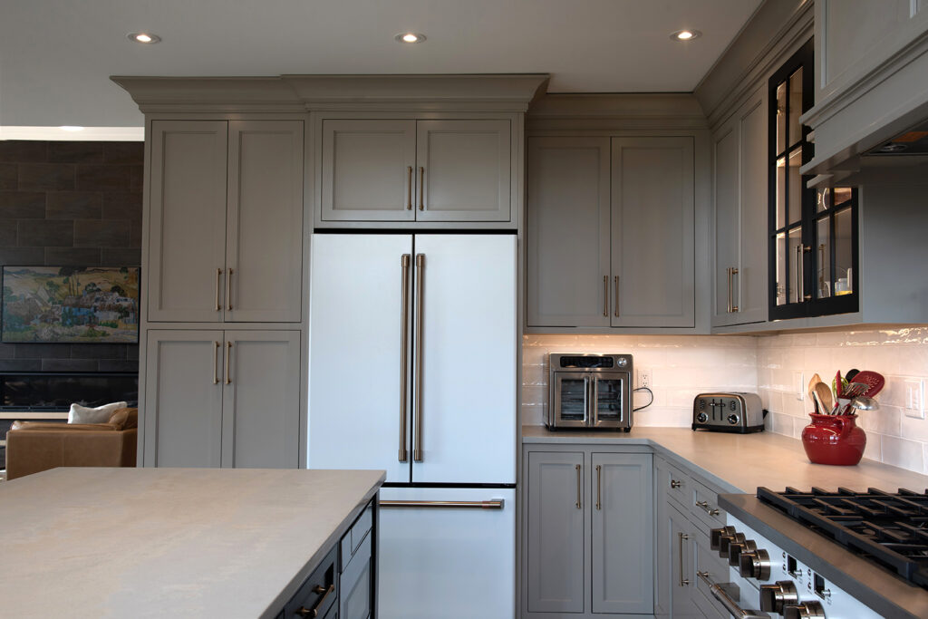 A Modern Kitchen Featuring a Refrigerator and Stove
