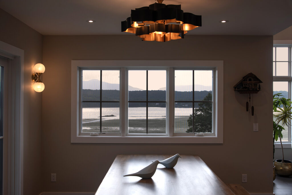 A Table Featuring Two Birds Perched on Its Surface