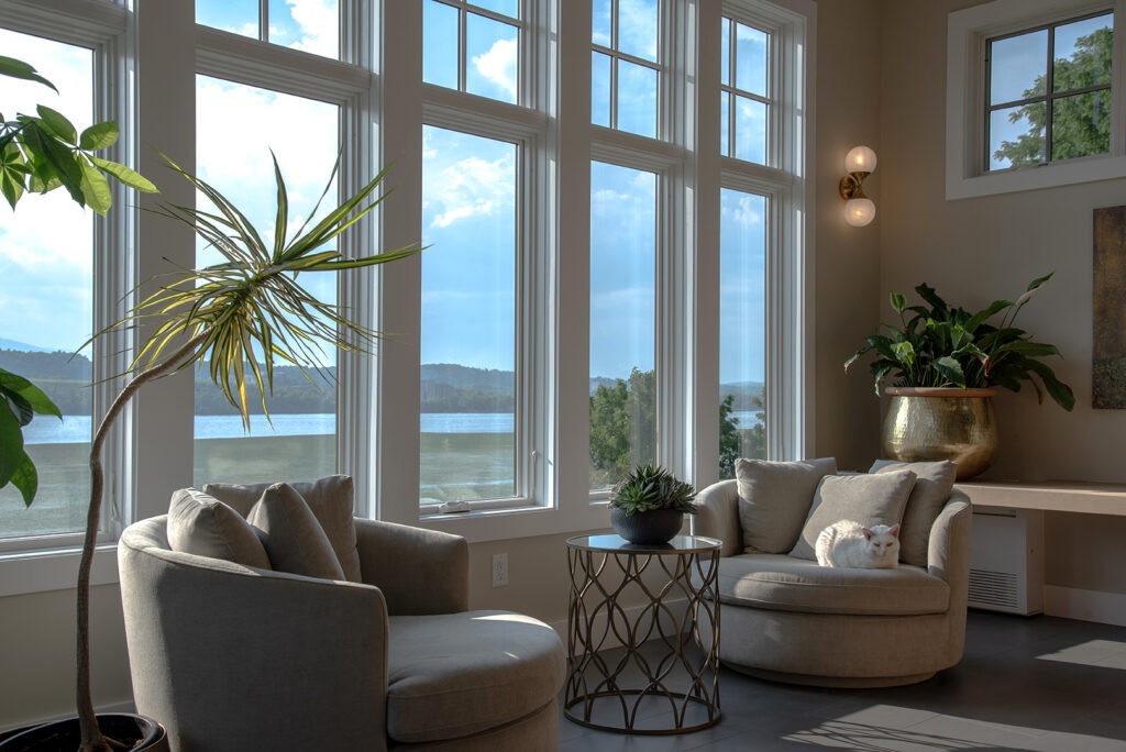 A Spacious Room Featuring a Large Window That Allows Natural Light to Illuminate the Interior