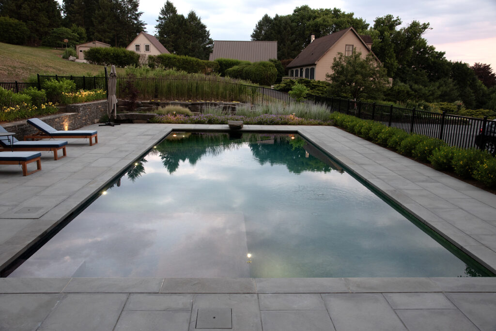 A Serene Pool Surrounded by a Patio