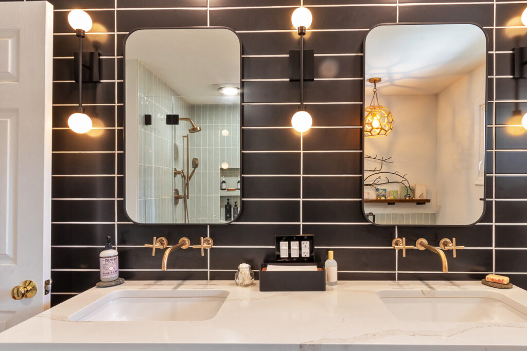 A Bathroom with Two Mirror