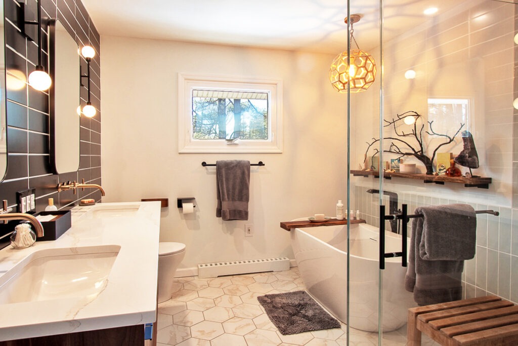 A Clean Bathroom Featuring a Spacious Bathtub and a Modern Sink