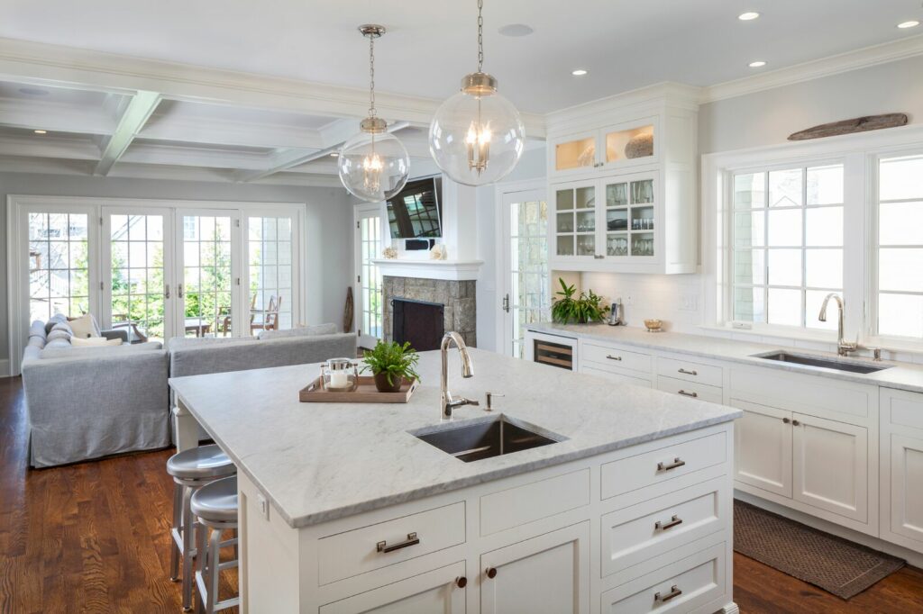 A Spacious Kitchen Featuring a Central Island and an Expansive Dining Room