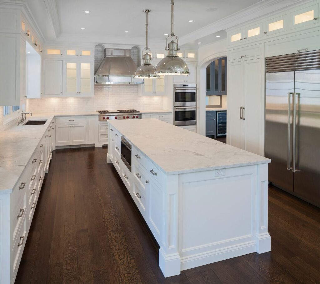 A Bright Kitchen Adorned With White Cabinetry