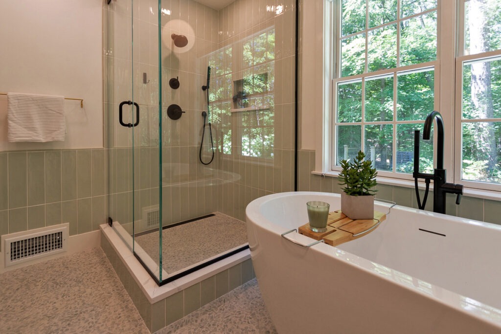 A Modern Bathroom Featuring a Glass Shower Door