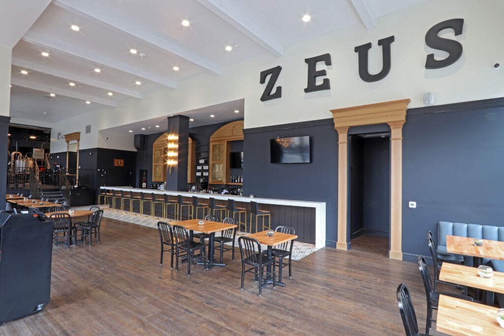 A Stylish Hotel Bar Adorned in Black and Gold